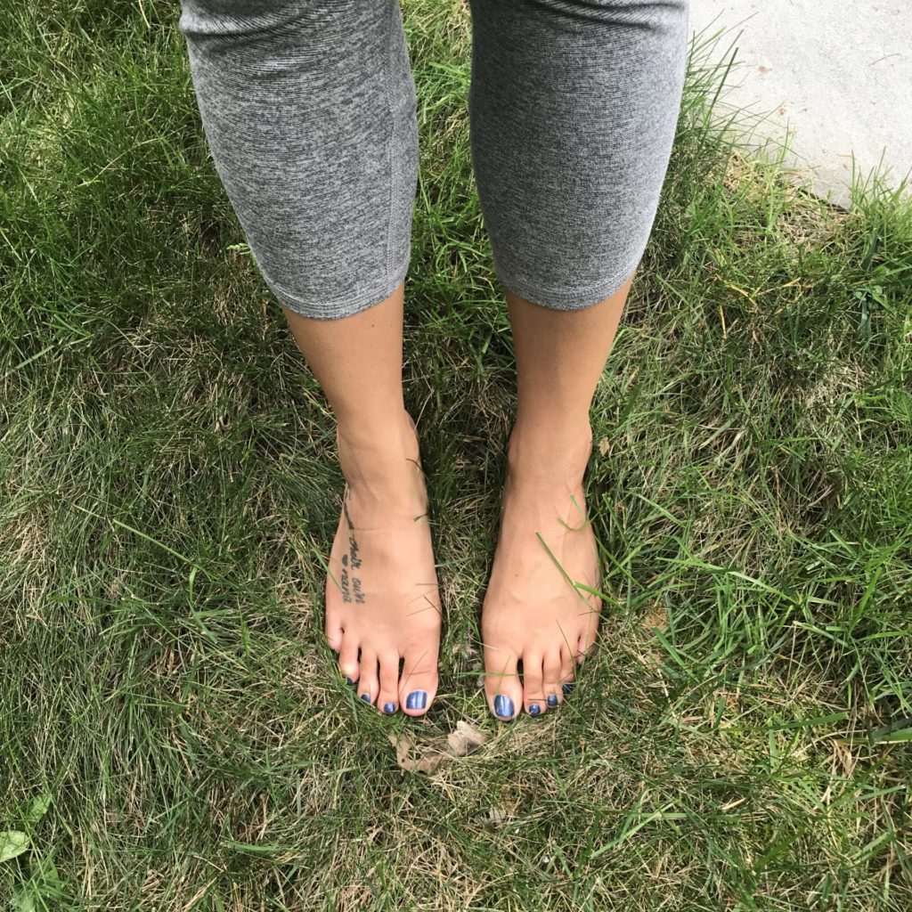 grounding feet in grass